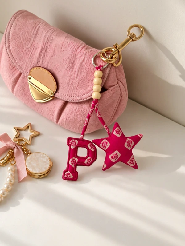 Pink Bandhani Customizable Letter Keychain With Tassel and Star Charm 2